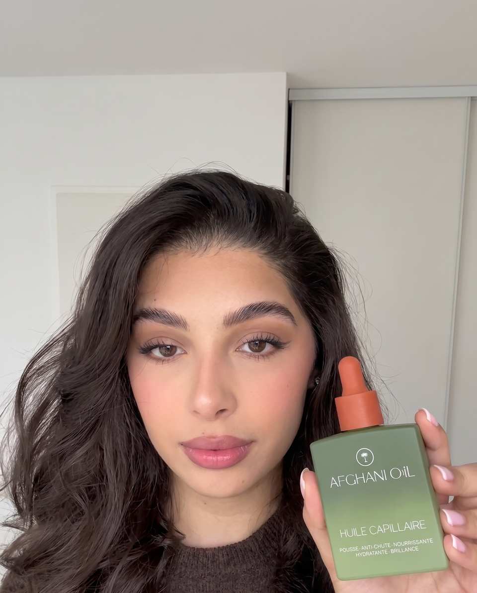 The bottle held in hand